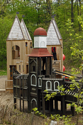 a wooden castle-like structure in the children’s playground in High Park