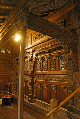 ornate wood carving inside the Javanese tea house