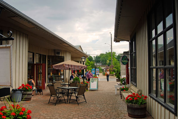 outdoor tables on the patio of the Elora Mews