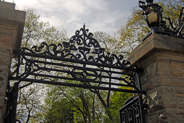 stone and wrought iron gates at the Parkside Drive entrance to High Park in Toronto