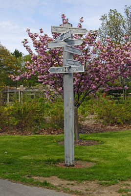 a post with signs to various parts of Hendrie Park